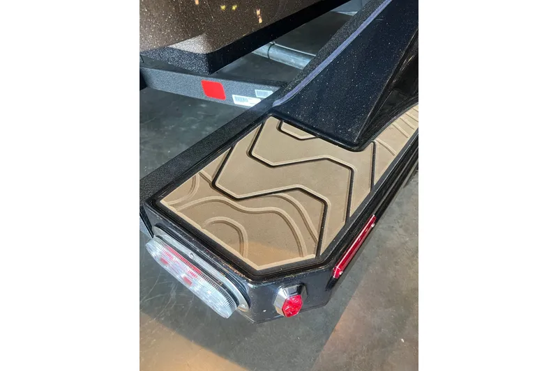 Slide: The Image of Rear view of 2027 Nitro Z20 XL boat trailer with textured step and lights. - 10
