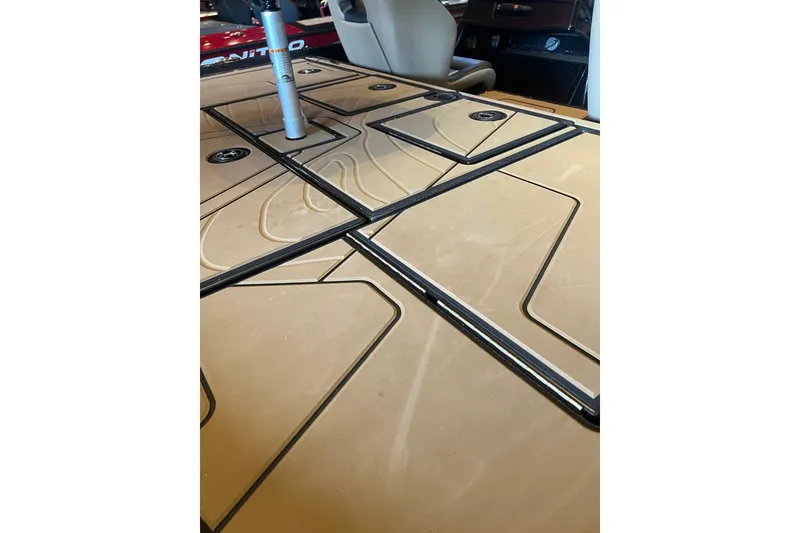 Slide: The Image of Deck of 2027 Nitro Z20 XL boat with storage compartments and seating. - 12