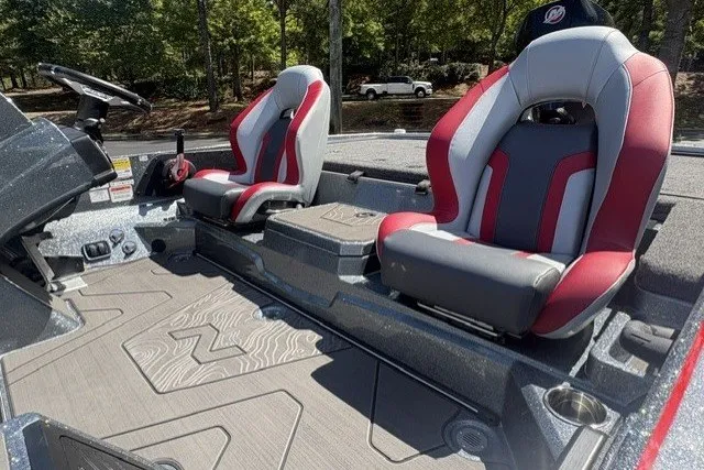 Slide: The Image of 2027 Nitro Z21 XL Pro boat interior with red and gray seats, modern design. - 6