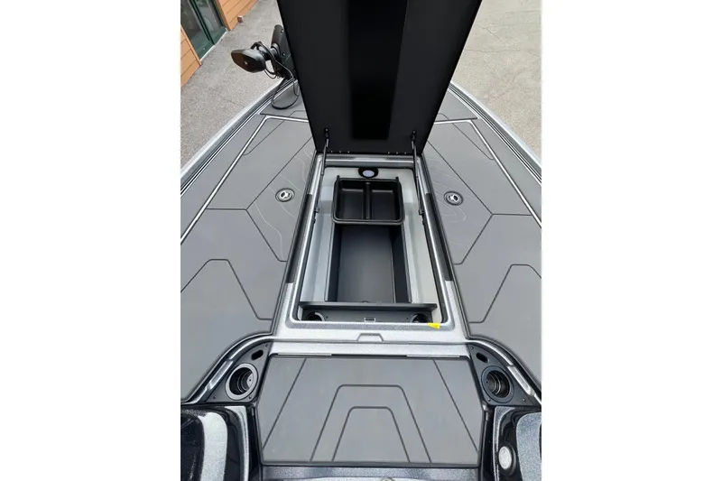 Slide: The Image of 2027 Nitro Z20 XL Pro boat storage compartment, open lid, sleek design. - 11