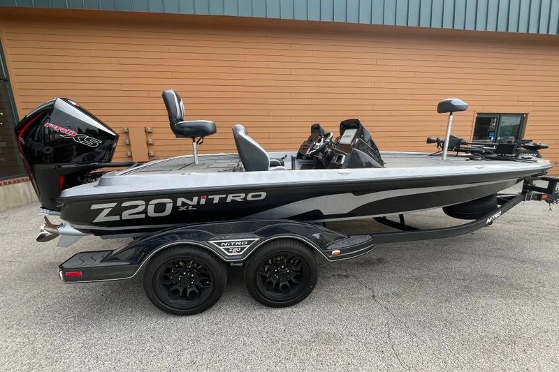 The Image of 2027 Nitro Z20 XL Pro fishing boat with dual console and powerful outboard motor. - 0