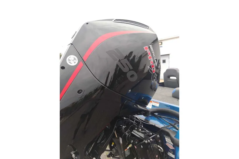 Slide: The Image of 2027 Nitro Z21 XL Pro boat engine with sleek black and red design. - 8
