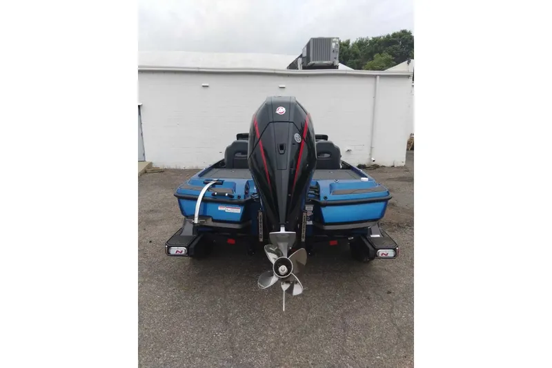 Slide: The Image of 2027 Nitro Z21 XL Pro boat, rear view with powerful outboard motor. - 4