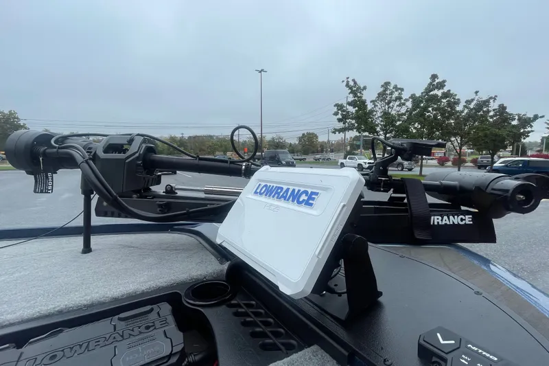 Slide: The Image of Nitro Z20 XL 2027 boat with Lowrance electronics and trolling motor in a parking lot. - 4