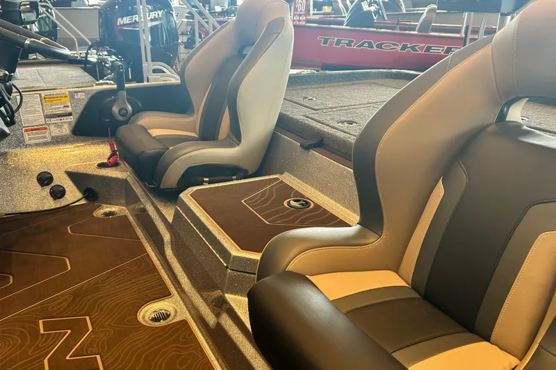 Slide: The Image of Interior of 2027 Nitro Z21 XL Pro boat with comfortable seating and sleek design. - 12