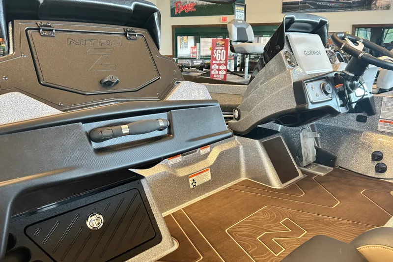 Slide: The Image of 2027 Nitro Z21 XL Pro boat interior with Garmin navigation system. - 11