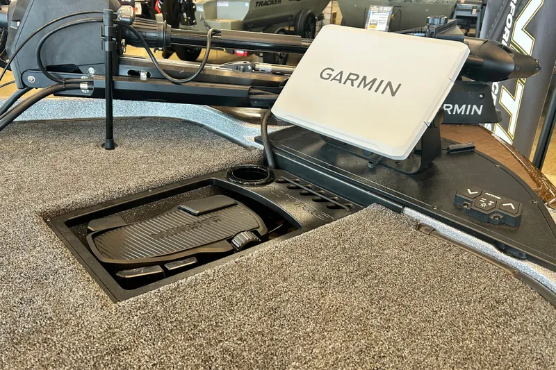 Slide: The Image of 2027 Nitro Z21 XL Pro boat with Garmin navigation system and foot pedal controls. - 8