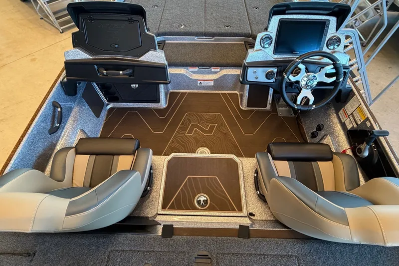 Slide: The Image of 2027 Nitro Z21 XL Pro boat interior with modern dashboard and comfortable seating. - 2