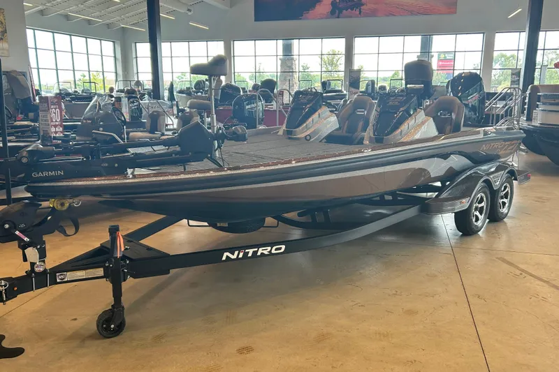Slide: The Image of 2027 Nitro Z21 XL Pro boat displayed in a showroom with modern design and features. - 4