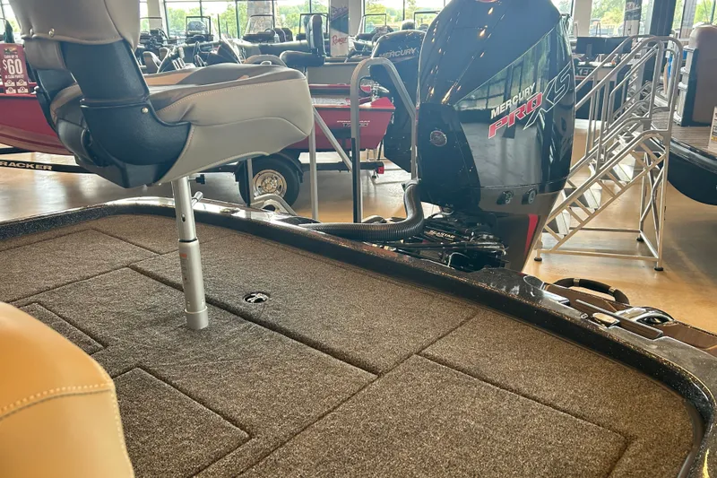 Slide: The Image of 2027 Nitro Z21 XL Pro boat interior with Mercury Pro XS engine in showroom. - 13