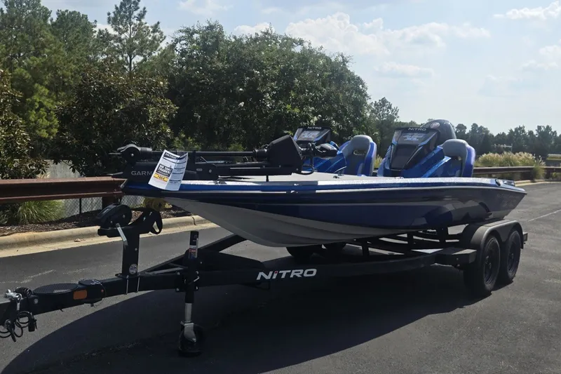 Slide: The Image of 2027 Nitro Z18 XL Pro boat on trailer, parked outdoors, sunny day. - 5