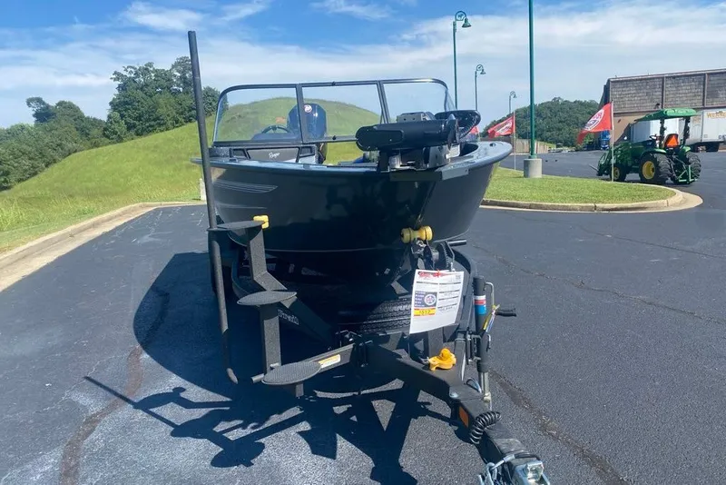 Slide: The Image of 2026 Ranger VX1888 WT boat on trailer in parking lot, sunny day. - 4