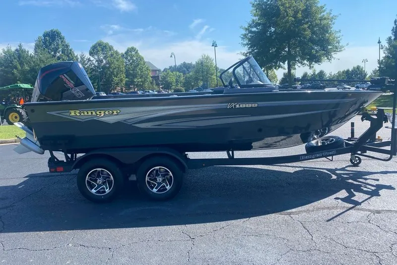 Slide: The Image of 2026 Ranger VX1888 WT boat on trailer in sunny outdoor setting. - 3