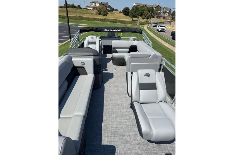 Slide: The Image of 2027 Sun Tracker SportFish 20 DLX pontoon boat with spacious seating and modern design. - 13