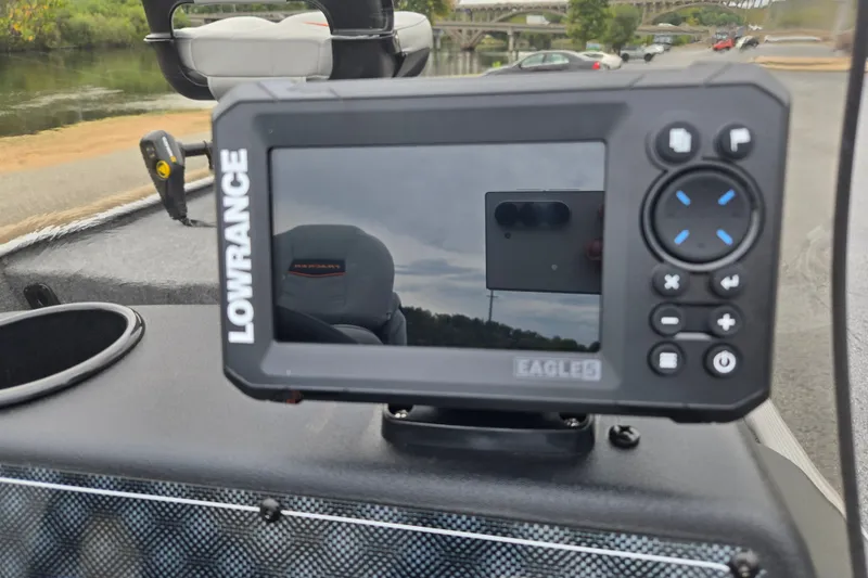 Slide: The Image of Lowrance fish finder on 2027 Tracker Bass Tracker Classic Limited boat dashboard. - 13