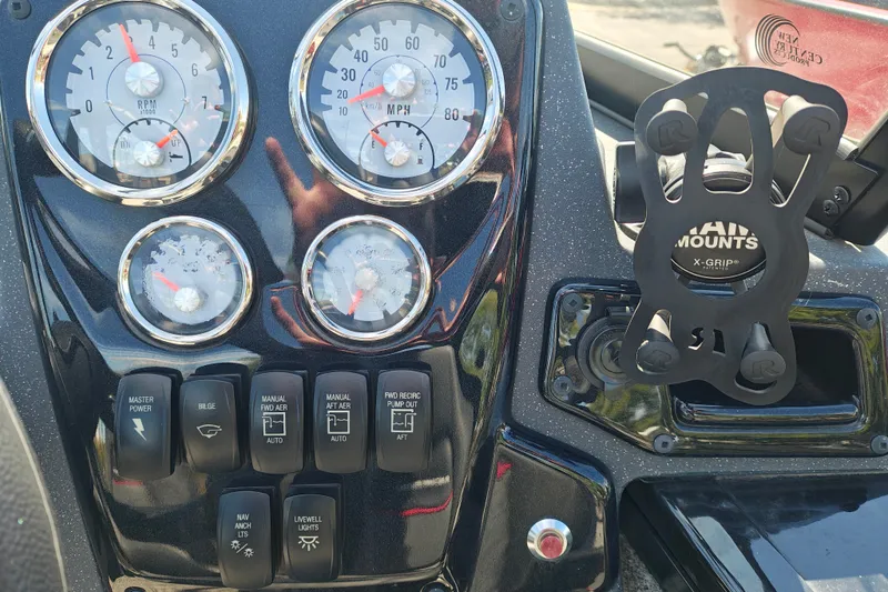 Slide: The Image of Dashboard of 2025 Tracker Targa V-18 WT boat with gauges and controls. - 32