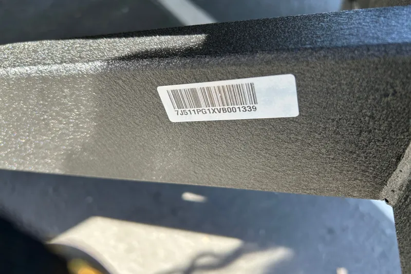 Slide: The Image of Barcode on 2027 Tracker Super Guide V-16 SC boat component, displaying serial number. - 45