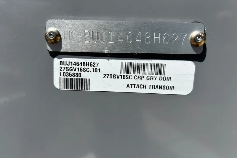 Slide: The Image of Hull identification number plate on a 2027 Tracker Super Guide V-16 SC boat. - 43