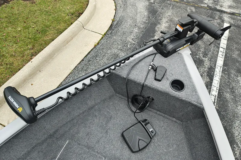 Slide: The Image of Trolling motor on 2027 Tracker Super Guide V-16 SC boat, parked on pavement. - 22