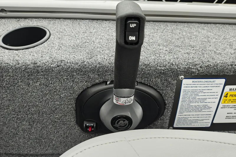 Slide: The Image of Throttle control of 2027 Tracker Super Guide V-16 SC boat with safety instructions. - 17