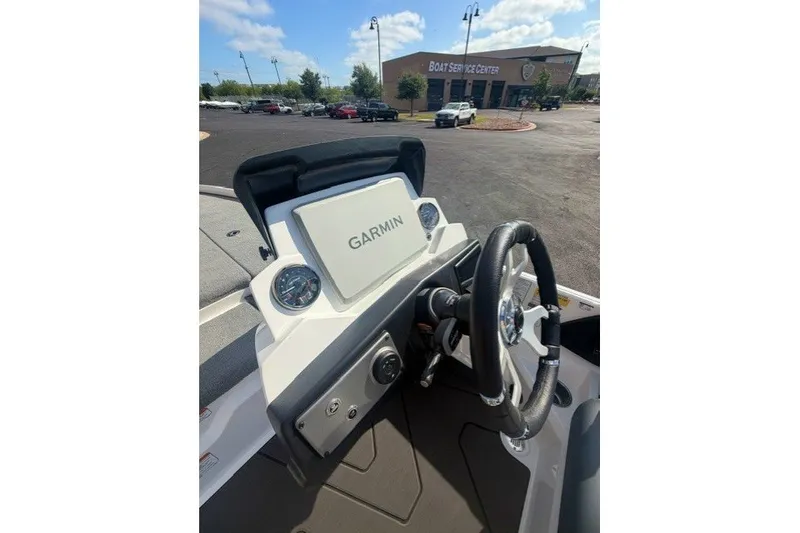 Slide: The Image of 2027 Nitro Z21 XL Pro boat dashboard with Garmin display at service center. - 7