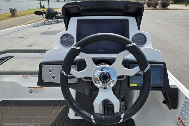 Slide: The Image of Steering console of a 2027 Nitro Z21 XL Pro boat with modern controls and displays. - 10