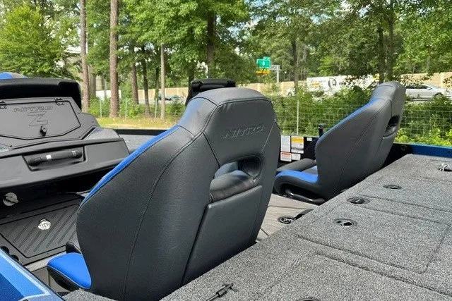 Slide: The Image of 2027 Nitro Z21 XL Pro boat interior with sleek seating and modern design. - 13