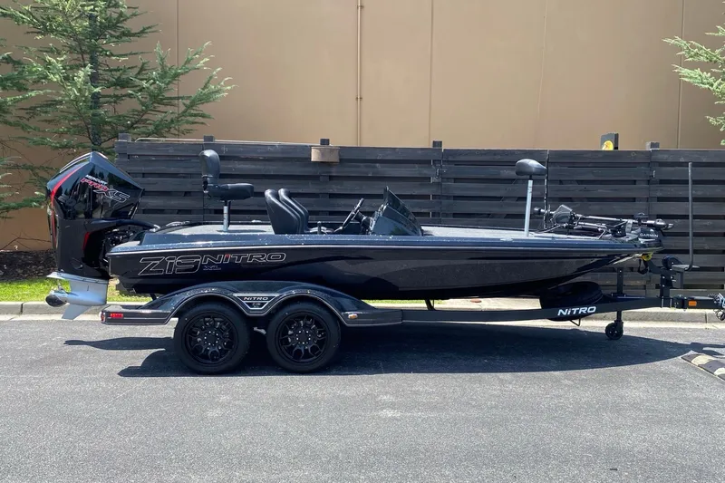 The Image of 2027 Nitro Z19 XL Pro boat on trailer, parked outdoors. - 0