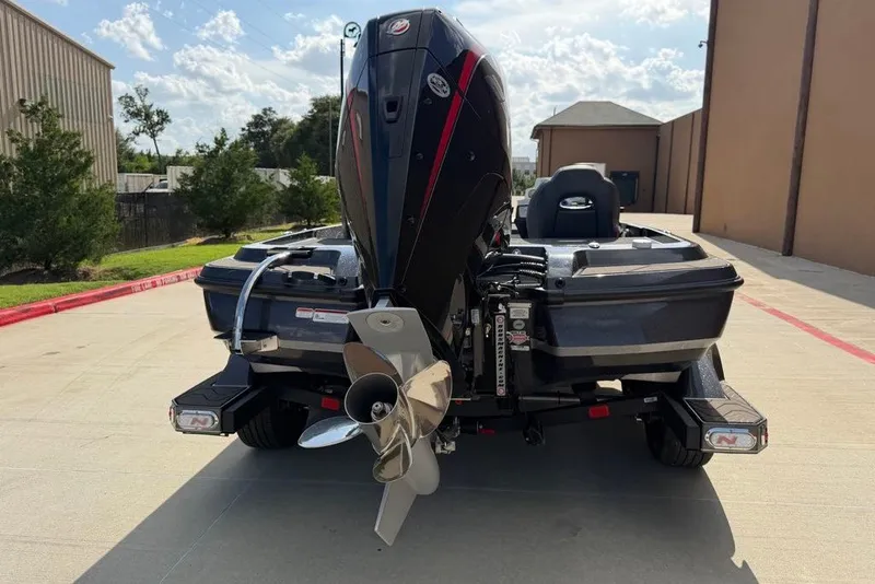 Slide: The Image of 2027 Nitro Z21 XL Pro boat rear view with powerful outboard motor. - 20