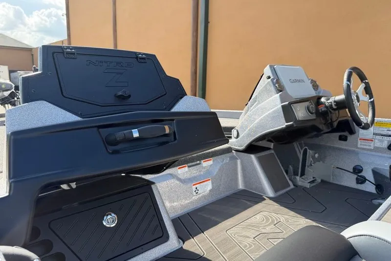 Slide: The Image of Interior of a 2027 Nitro Z21 XL Pro boat featuring a Garmin navigation system. - 15