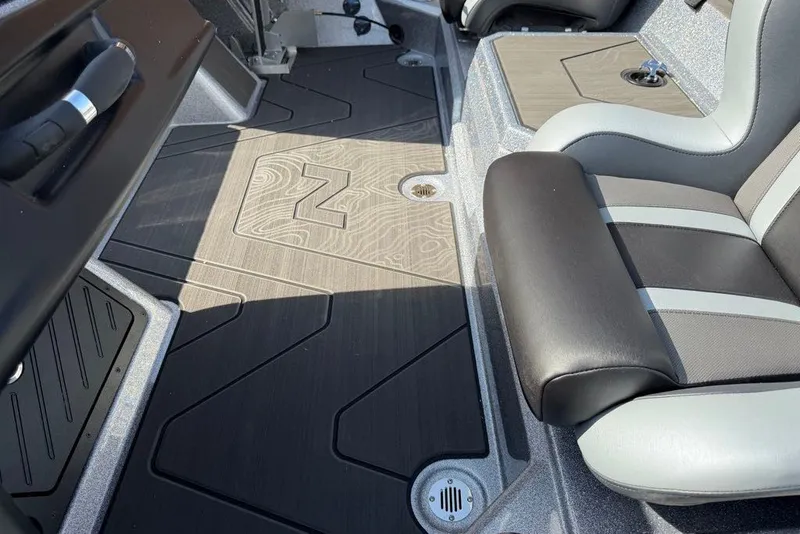 Slide: The Image of Interior of 2027 Nitro Z21 XL Pro boat with sleek seating and flooring design. - 14