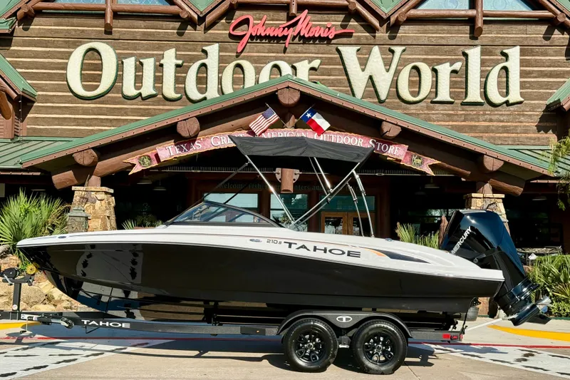 The Image of 2027 Tahoe 210 S boat displayed outside Johnny Morris' Outdoor World store. - 0