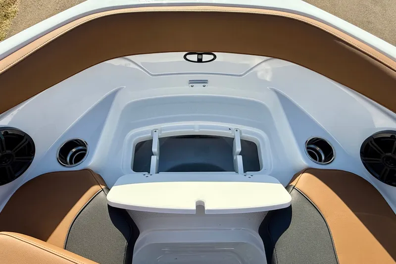 Slide: The Image of Interior of 2027 Tahoe 210 S boat with seating and speaker system. - 13