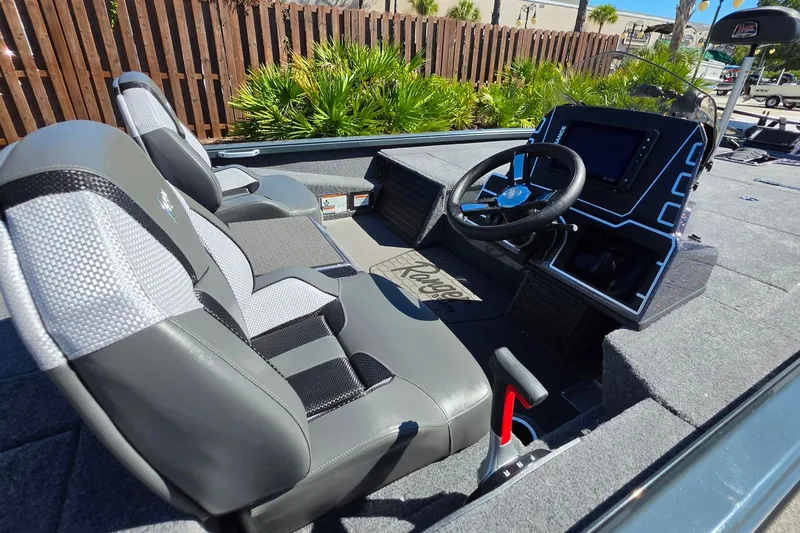 Slide: The Image of 2026 Ranger ALPHA 208 boat interior with modern dashboard and comfortable seating. - 17