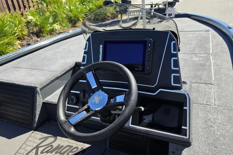 Slide: The Image of Steering console of 2026 Ranger ALPHA 208 boat with digital display and controls. - 15
