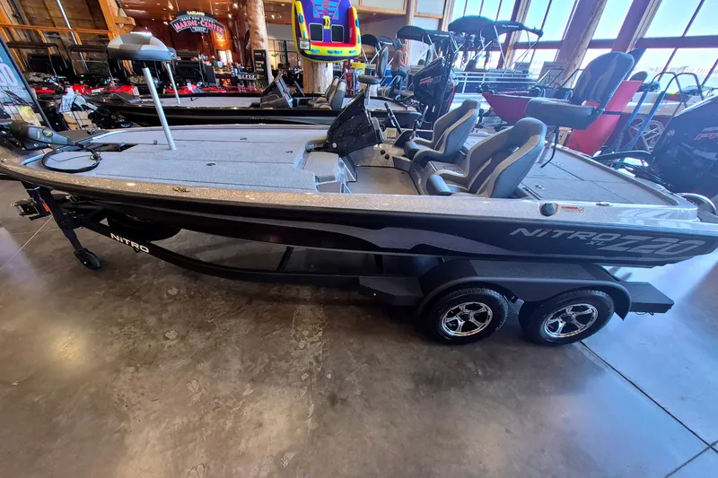 The Image of 2027 Nitro Z20 XL boat displayed indoors, featuring sleek design and dual seating. - 0