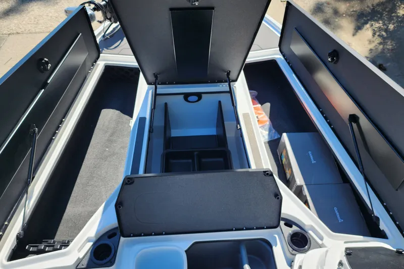 Slide: The Image of 2027 Nitro Z20 XL Pro boat storage compartments open, showcasing spacious interior design. - 7