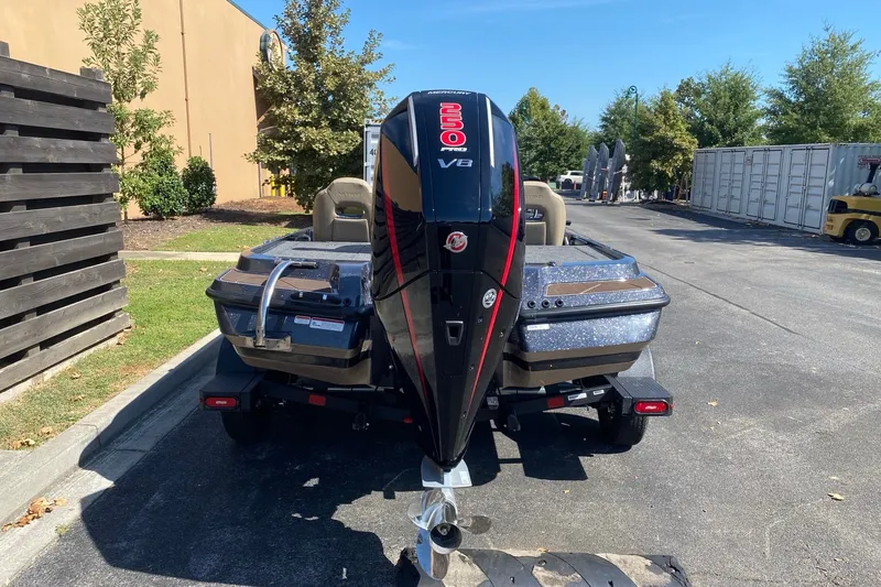 Slide: The Image of 2027 Nitro Z20 XL Pro boat with powerful V8 engine, parked outdoors. - 7