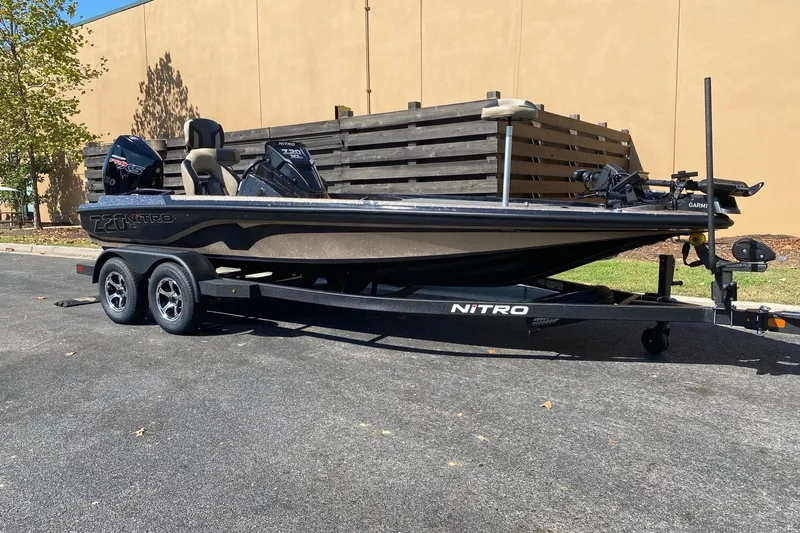 Slide: The Image of 2027 Nitro Z20 XL Pro boat on trailer, parked outdoors. - 6
