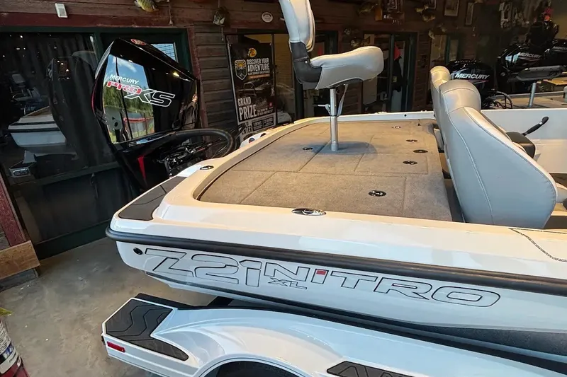 The Image of 2027 Nitro Z21 XL boat with Mercury Pro XS engine, displayed indoors. - 0
