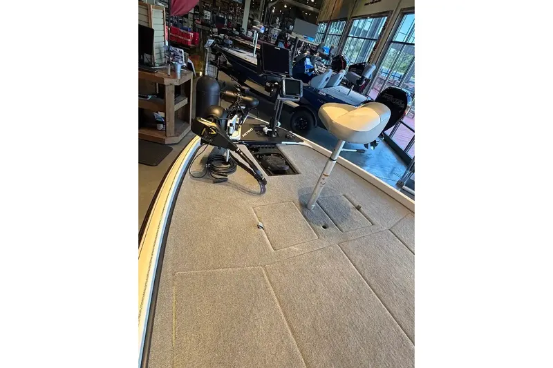 Slide: The Image of 2027 Nitro Z21 XL boat interior with fishing seat and equipment in showroom. - 10