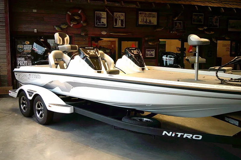 Slide: The Image of 2027 Nitro Z21 XL boat displayed indoors, featuring sleek design and dual seating. - 1