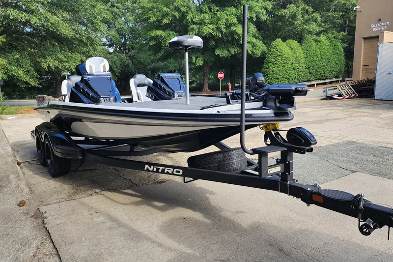 Slide: The Image of 2027 Nitro Z18 XL Pro boat on trailer, parked outdoors. - 3