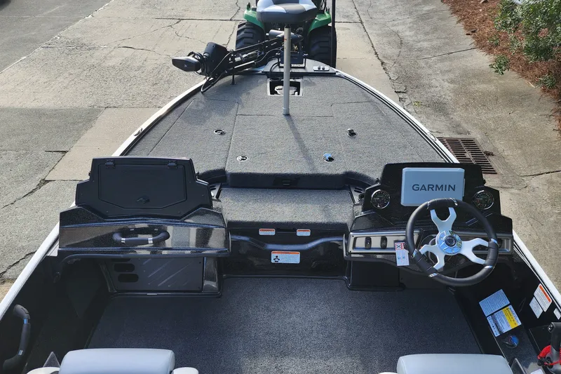 Slide: The Image of 2027 Nitro Z18 XL Pro boat interior with Garmin navigation system and steering wheel. - 4