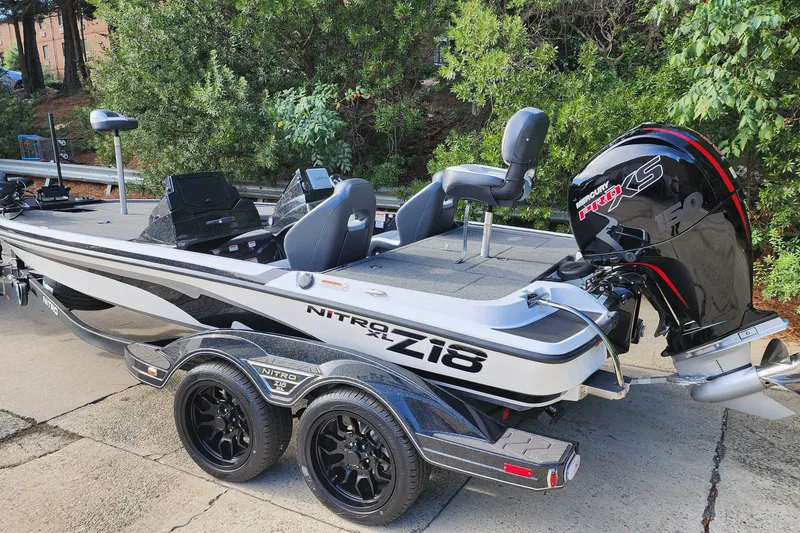 Slide: The Image of 2027 Nitro Z18 XL Pro boat with Mercury Pro XS engine, parked on a trailer. - 2
