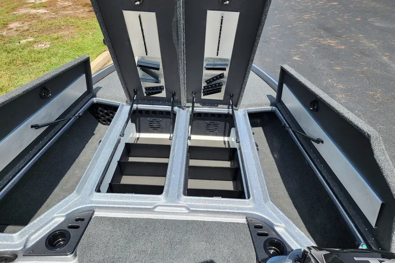 Slide: The Image of 2027 Nitro Z21 XL Pro boat storage compartments open, showcasing spacious interior design. - 5
