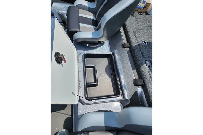 Slide: The Image of 2027 Nitro Z21 XL Pro boat interior with open storage compartment and seating. - 10