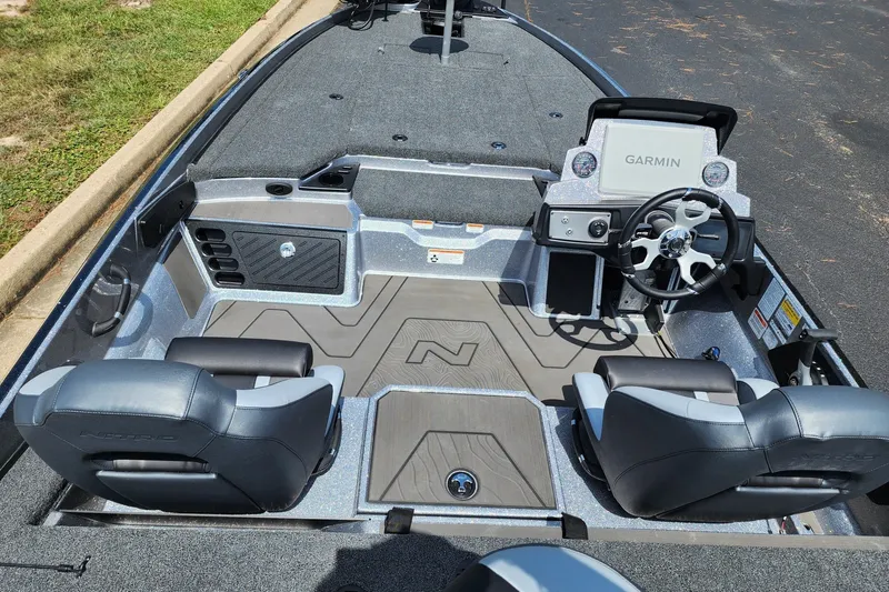 Slide: The Image of 2027 Nitro Z21 XL Pro boat interior with Garmin navigation system and dual seating. - 6