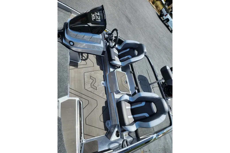 Slide: The Image of 2027 Nitro Z21 XL Pro boat interior with sleek seating and modern dashboard design. - 9