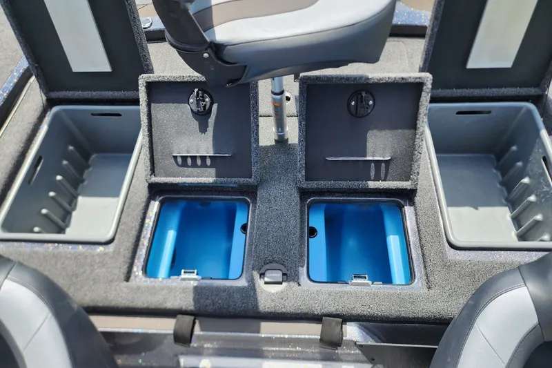 Slide: The Image of 2027 Nitro Z21 XL Pro boat interior with open storage compartments and seating. - 11